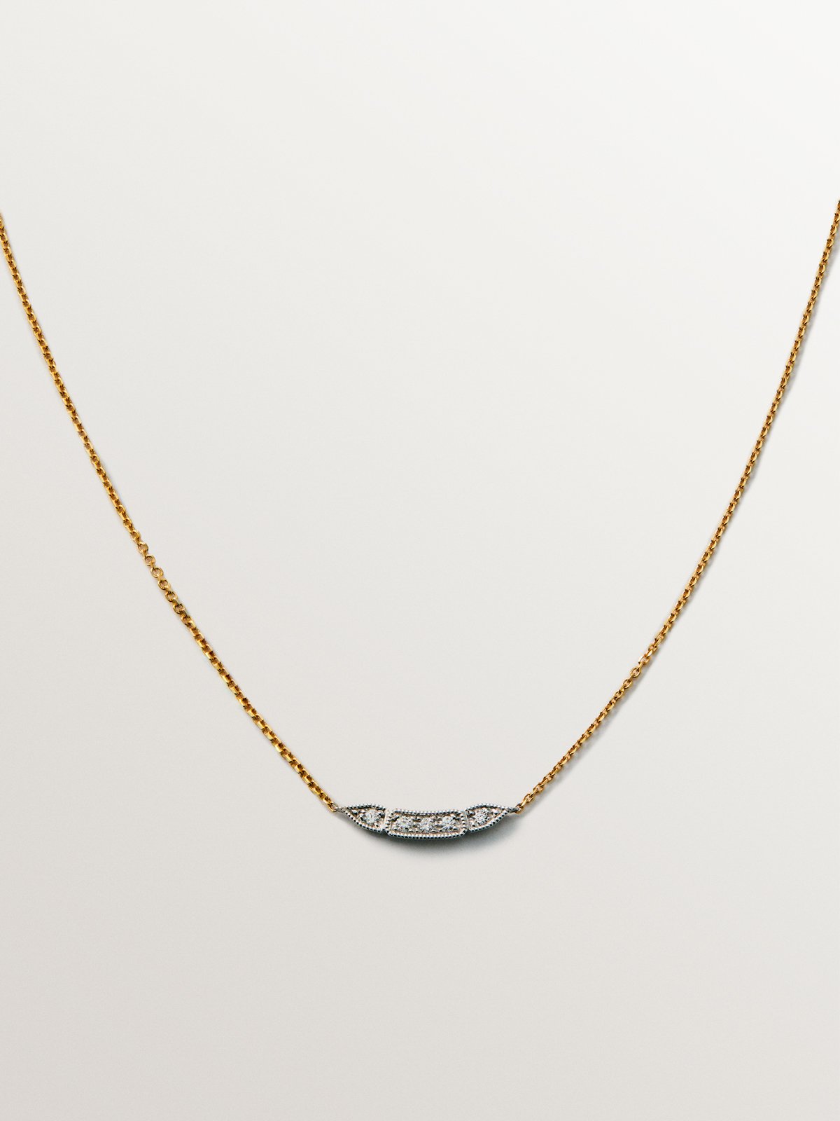 18K white and yellow gold pendant with brilliant-cut pavé diamonds